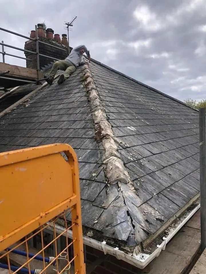 Slate roof ridge and chimney repair in Camborne
